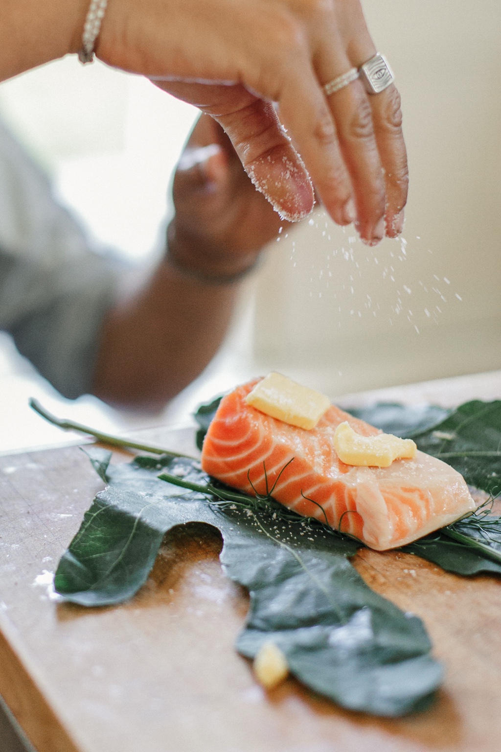 Finishing touches on a plated dish.